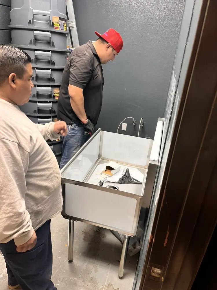 Commercial plumbing and sink installation in Andree